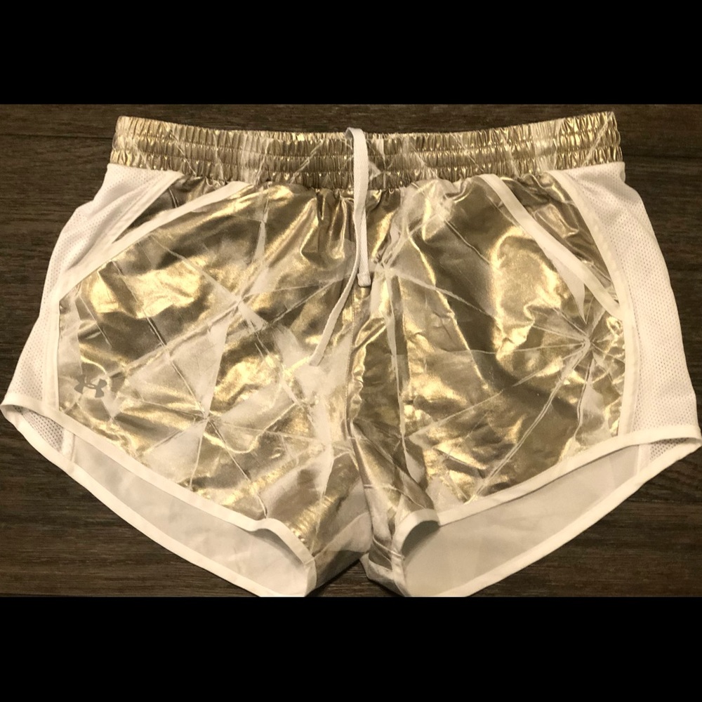 UA gold metallic shorts with pockets large
